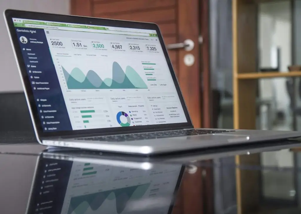 10 Best Ways to Make Money Online in Nigeria 4 laptop computer on glass-top table